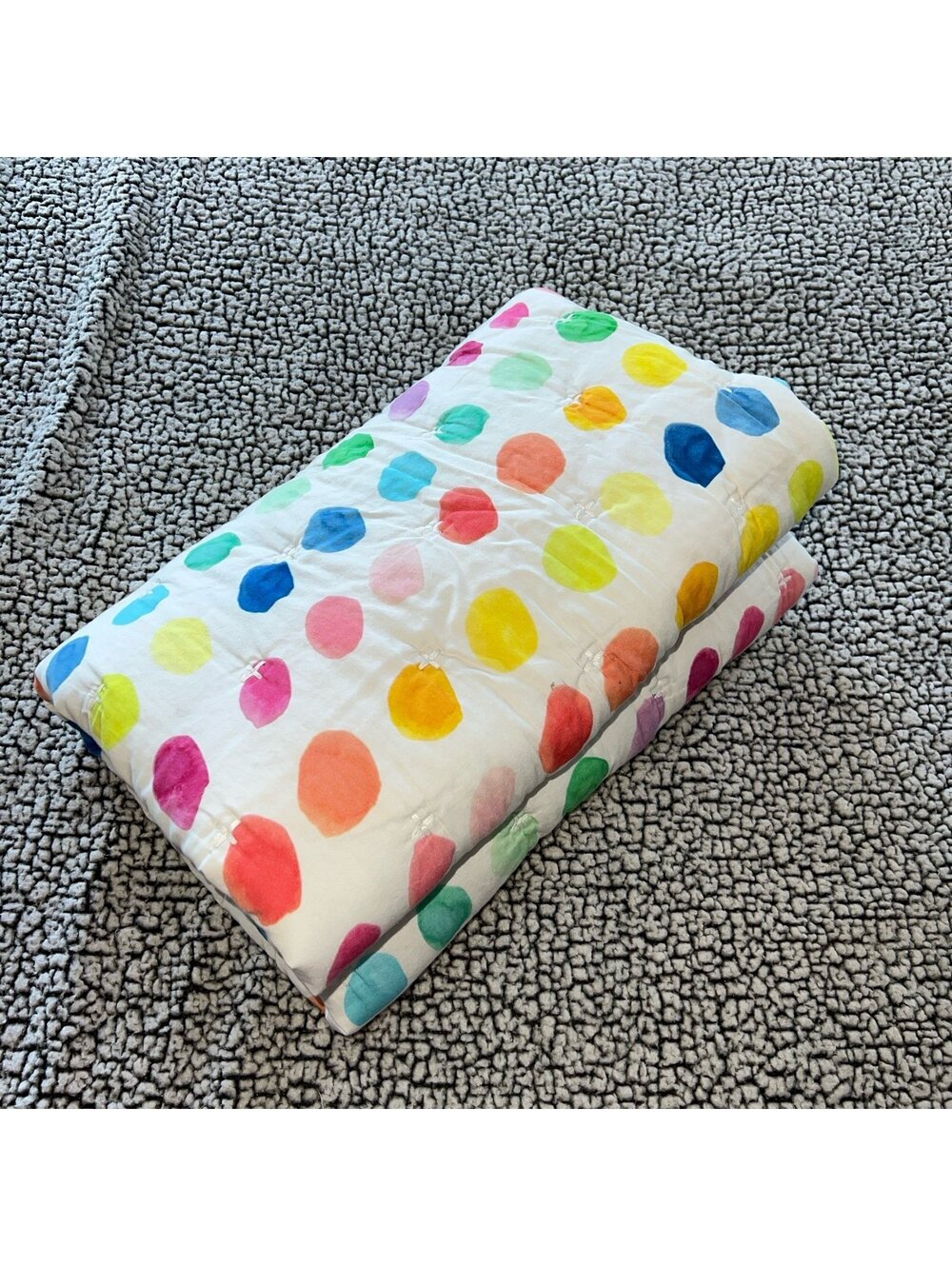 Lovevery rainbow dot organic cotton quilt